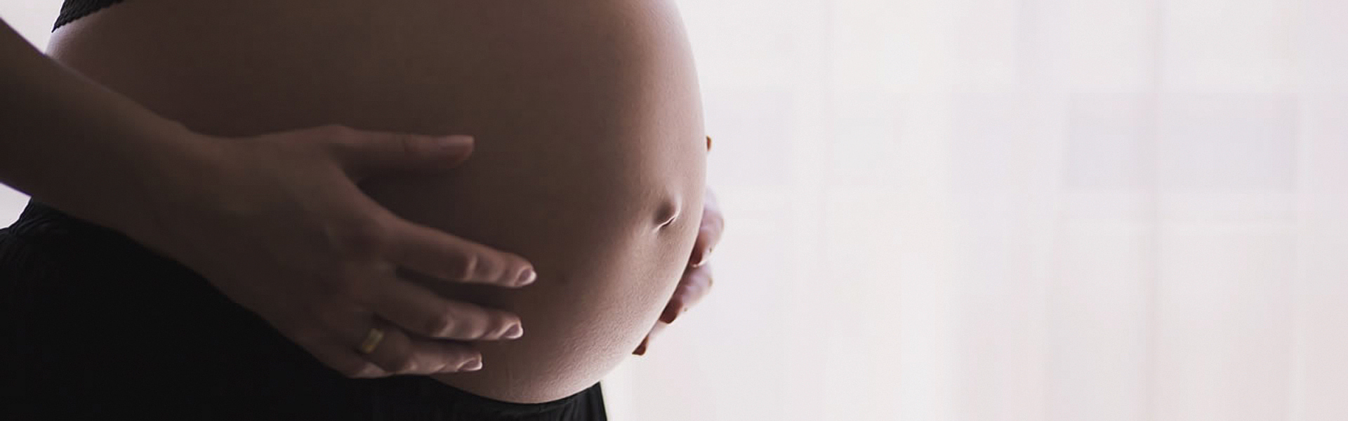A baby bump | Pregnancy Massage at Holmwood Clinic